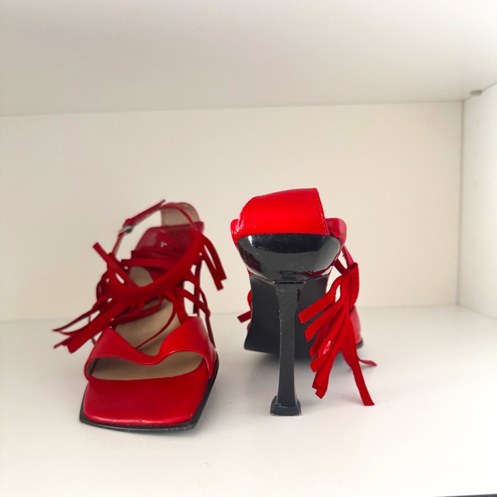 Fringe red heels
